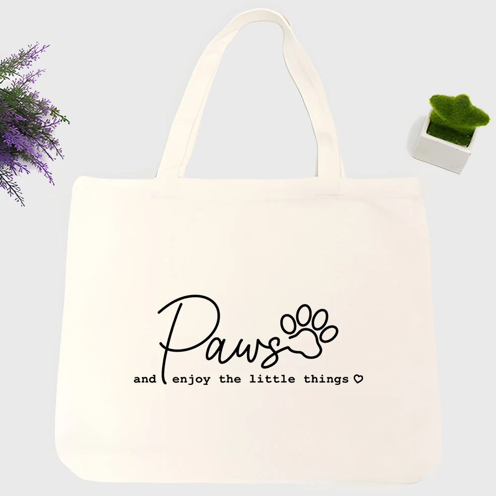 Women's paw print and handwritten text canvas tote bag, casual style for daily shopping and weekend outings