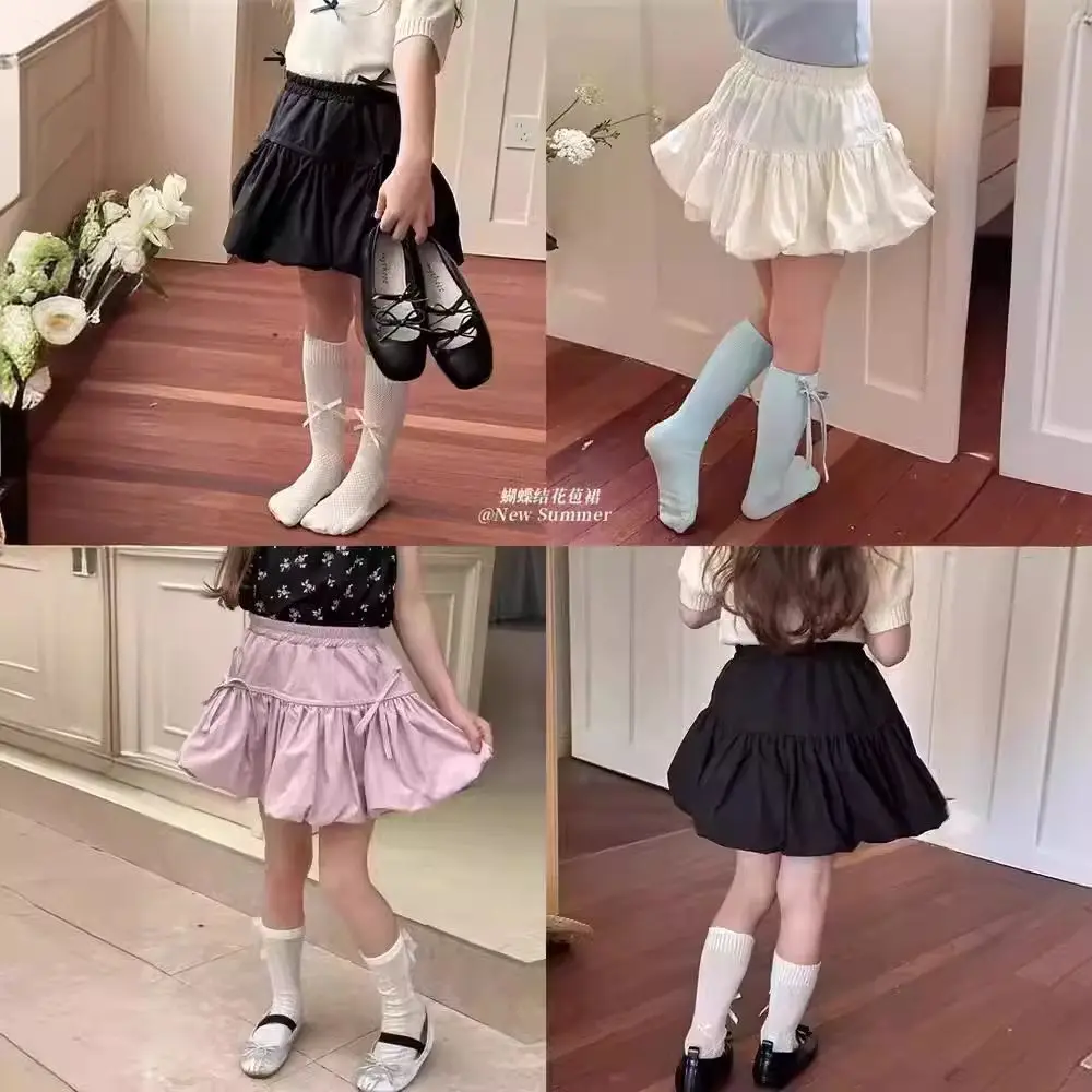 女の子の花のつぼみ半身スカート 2025 夏の新しいトレンディな子供の甘くてかわいいリボンショートスカート