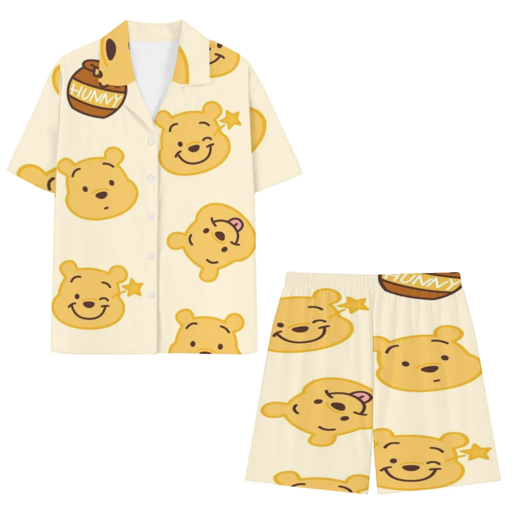 

Winnie The Pooh long-sleeved cotton pajamas set for men and women with strawberry doll print.