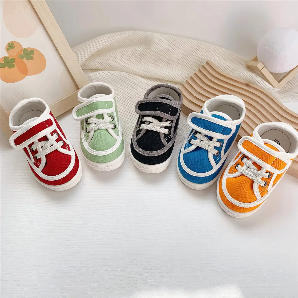 2025 japonés único nuevo producto Color sólido lindo AB bebé suela suave zapatos para caminar bordado zapatos casuales de tela para niños