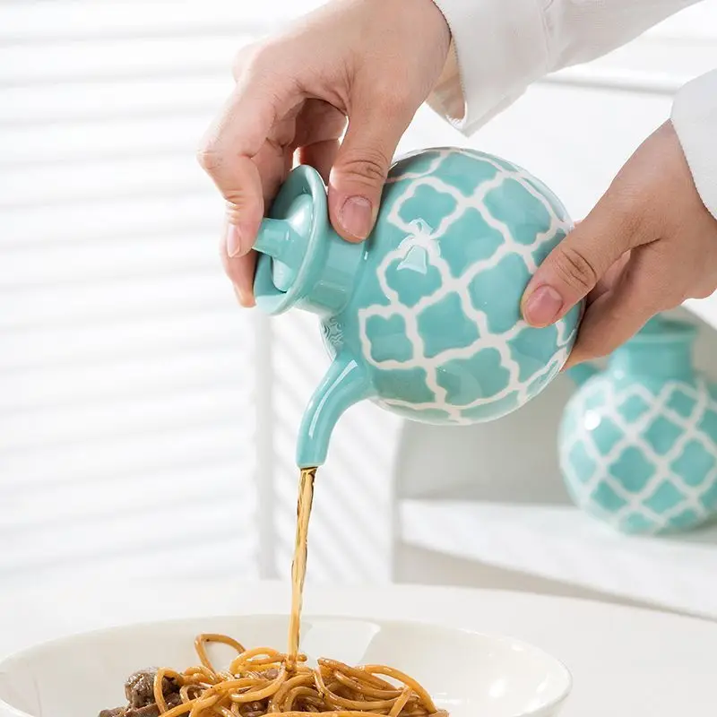 

Long-spout vinegar pot with relief geometric patterns, underglaze painted ceramic olive oil bottle, leak-proof seasoning bottle