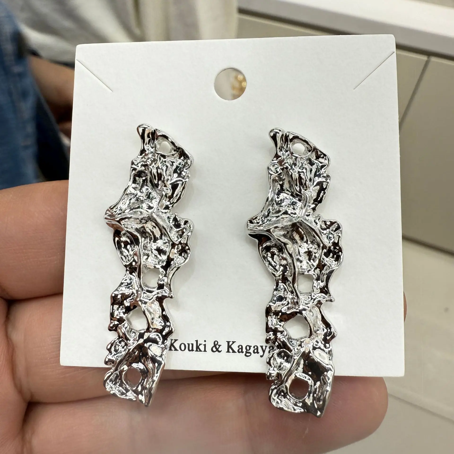 Irregular metal earrings women's cold wind high-end niche design sense special-shaped long strip sweet stud earrings new models