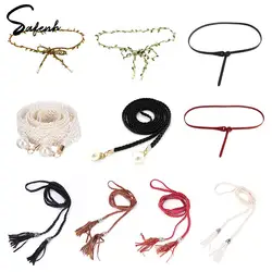 Cinturón de cadena de cintura con borlas de anillo tejido a mano para mujer, cinturón de estilo étnico femenino, chaqueta de plumón, cinturón de decoración de ropa