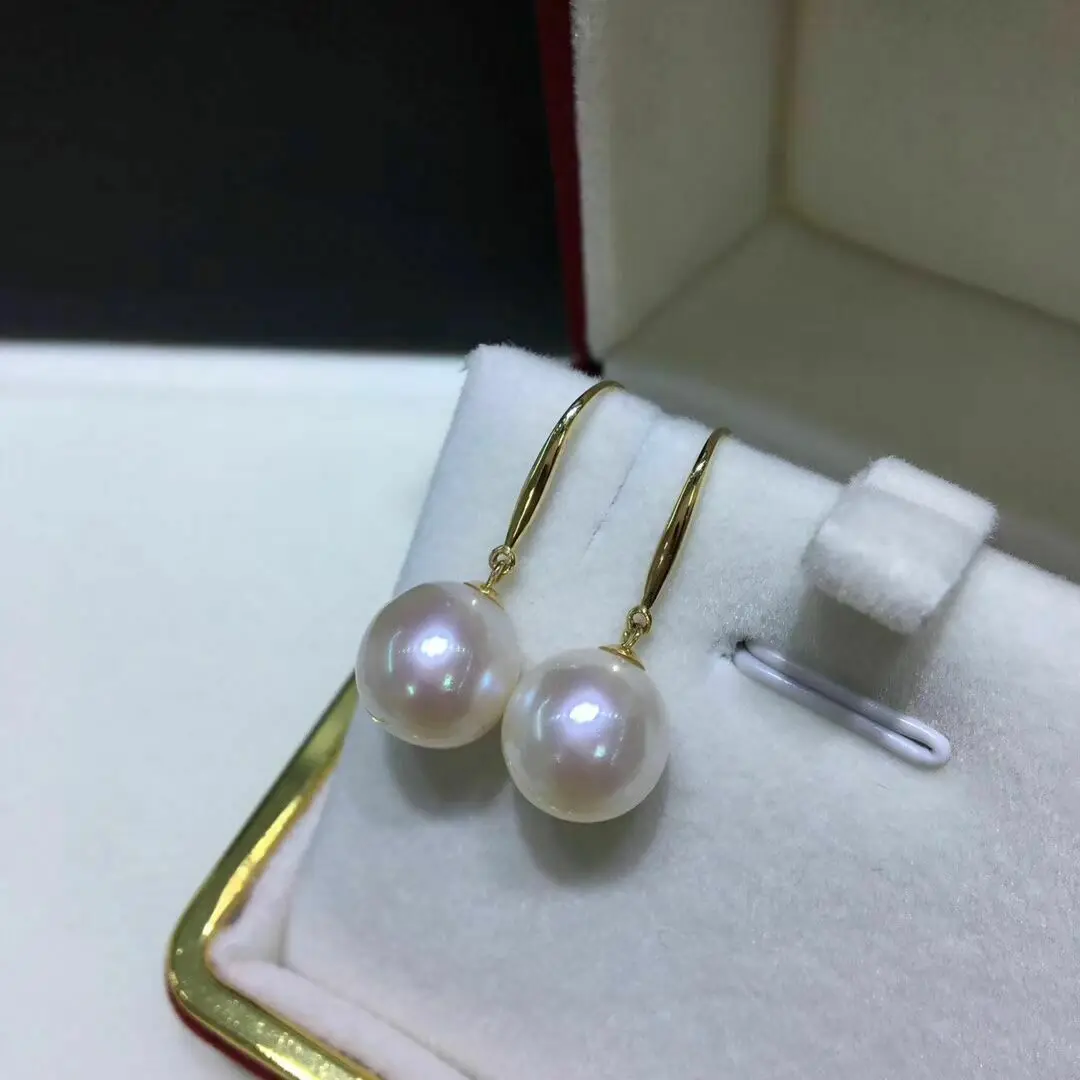 

Charming AAAA 10-11mm South Sea Round White Pearl Earrings 14K