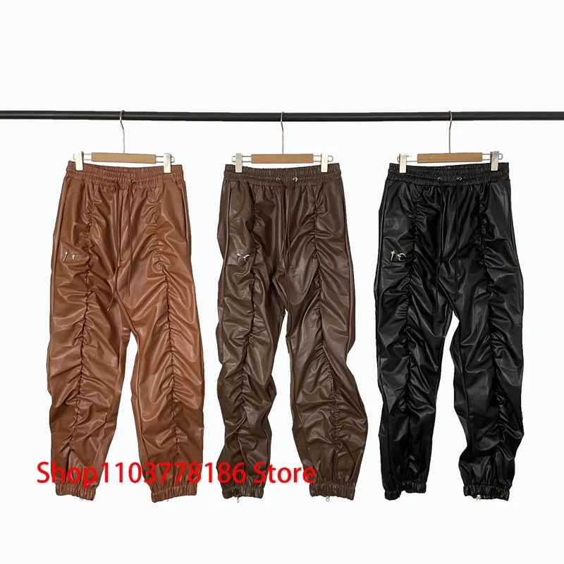 Europe America Street Pleated Design Sense Thug Club Leather Trousers Hip Hop Metal Logo Men Women Elastic Waist Casual Pants