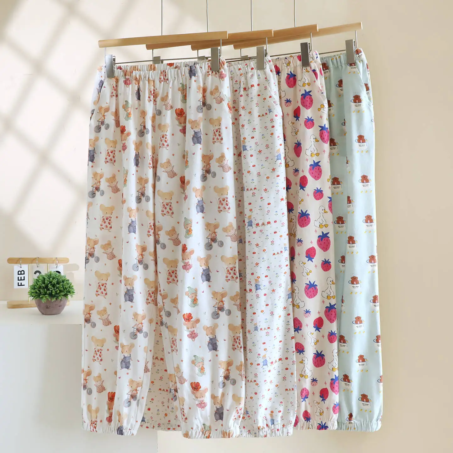 

Women's Elastic Waist Multi Colors Fashionable Printing Cotton Thin Loose Fit Medium Length Autumn Lounge Wear Trousers