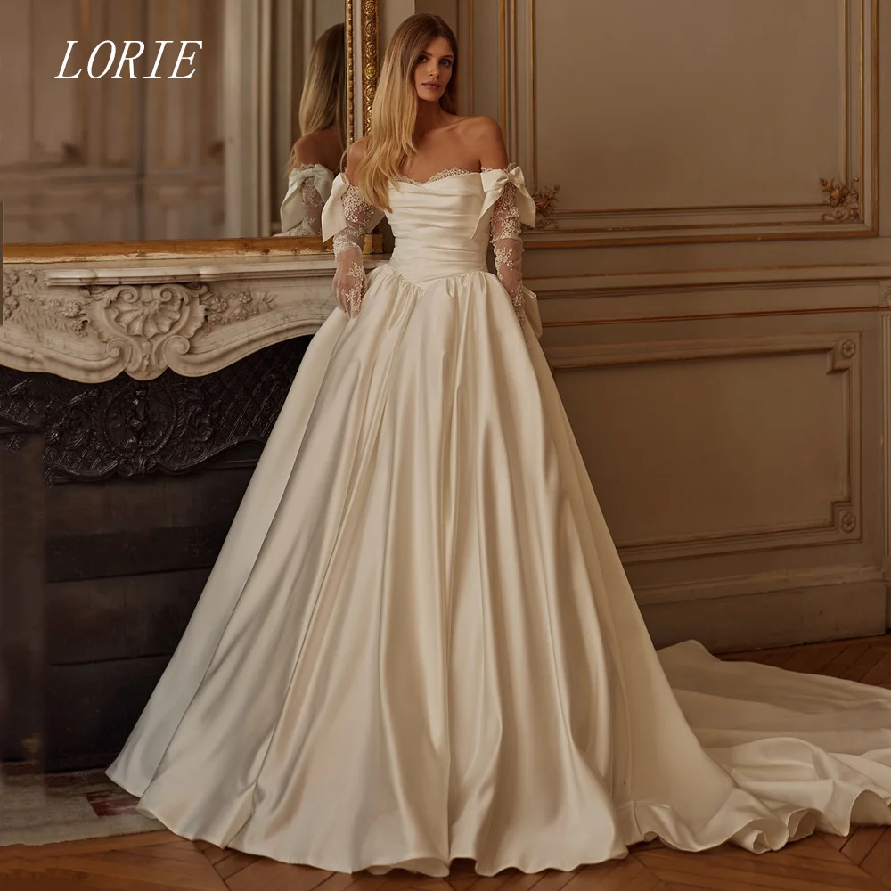 LORIE Luksusowa suknia ślubna w kształcie litery A z koralikami, kokardą, bez rękawów, aplikacjami i koronką, szyta na miarę, kolekcja 2026