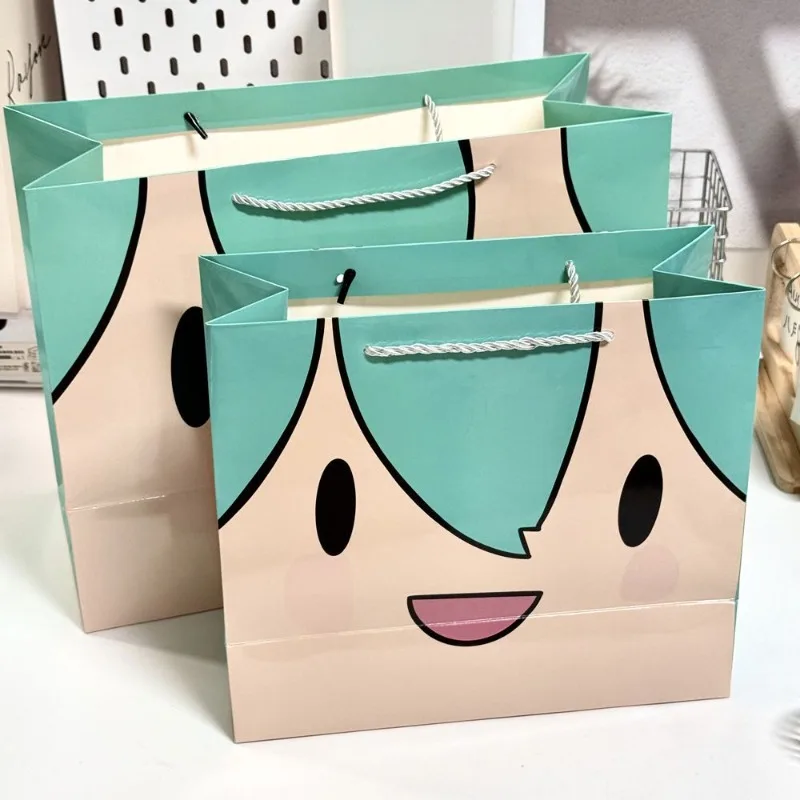 Hatsune Miku bolsa de regalo de dibujos animados lindo compras bidimensionales de gran capacidad portátil regalo de cumpleaños bolsa de embalaje hecha a mano