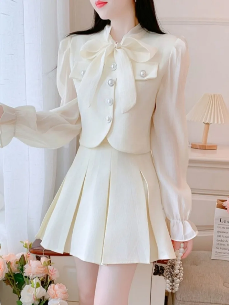 New French Small Fragrant Women's Two Piece Set High End Autumn Lace-Up Bow Tie Long Sleeve Short Jacket + Mini Skirt Suit