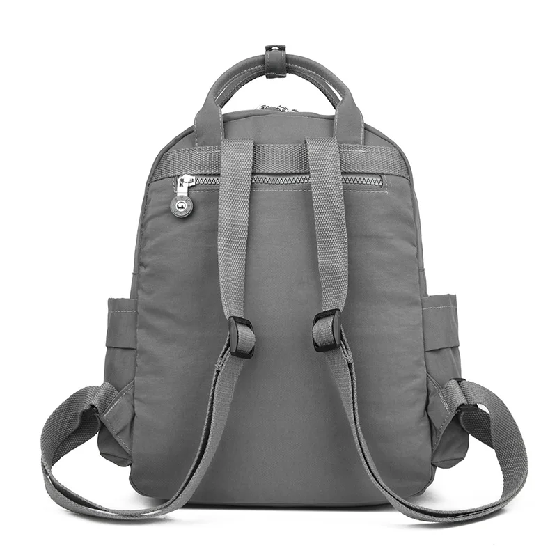 حقيبة ظهر كاجوال بسيطة للطلاب من Mochila ذات سعة كبيرة وجيوب متعددة مع حقيبة ظهر مناسبة للمدرسة الثانوية وحقائب الظهر للتنقل اليومي