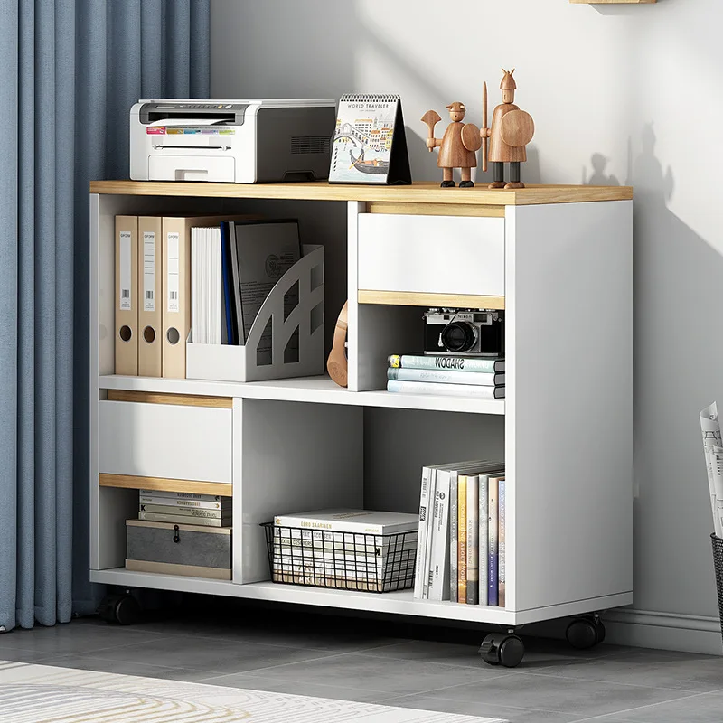 Floor-to-ceiling storage: The living room relies on storage and layered shelves, simple low bookcases