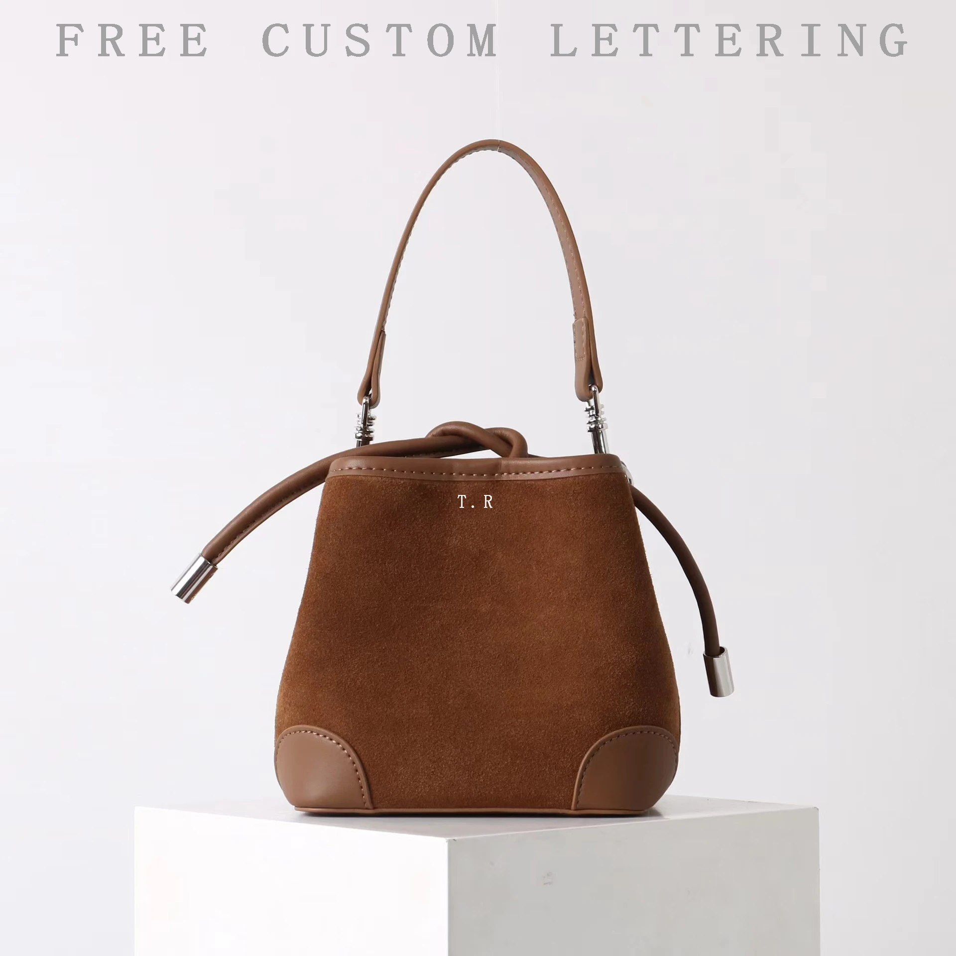 

Frosted cowhide mini drawstring bucket bag 2025 new design vintage wool striped one-shoulder crossbody bag fashion lady handbag