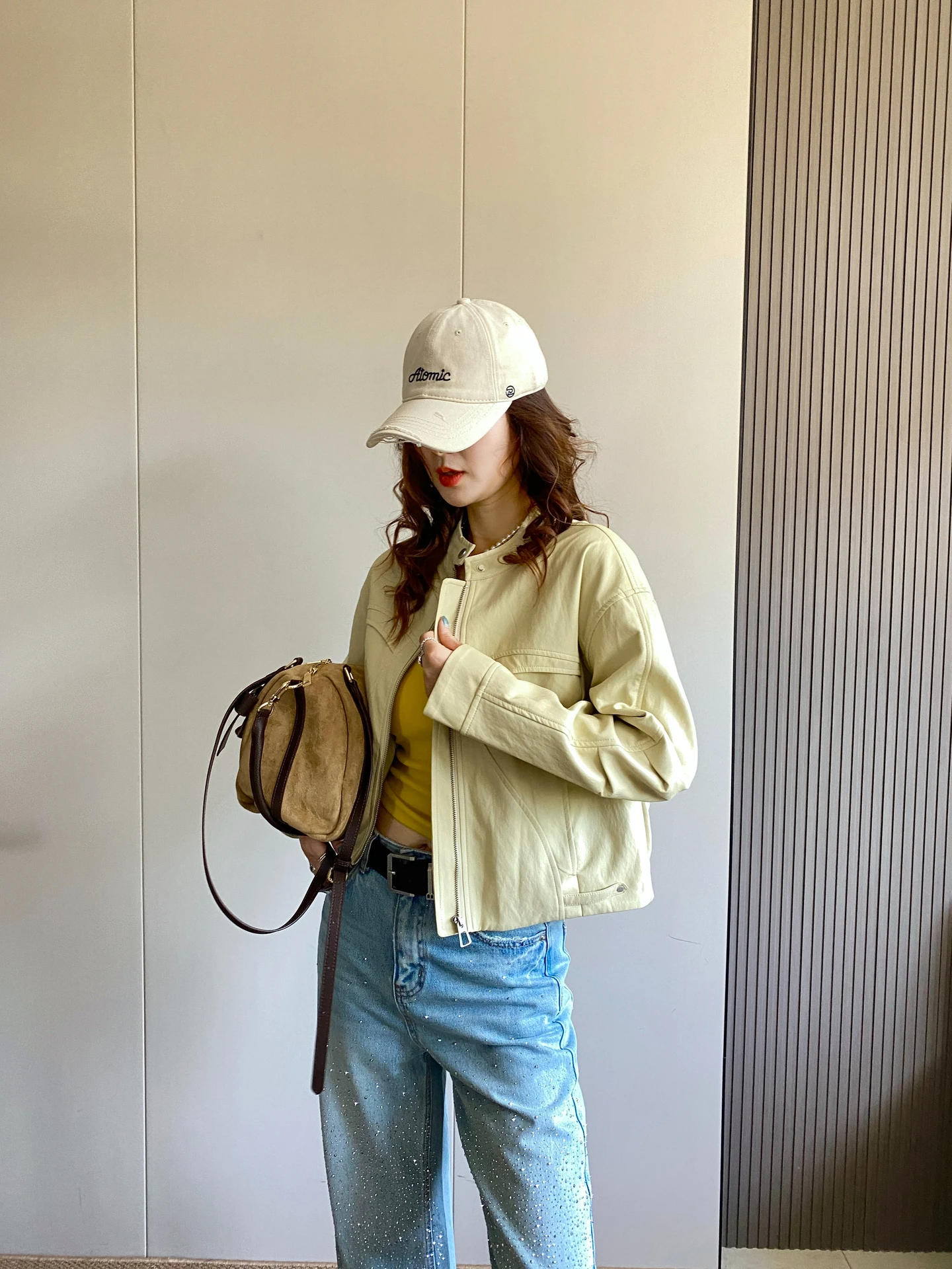 Jaqueta Feminina de Couro PU Primavera 2026 com Gola Alta, Caimento Solto, Efeito Emagrecedor, Estilo Motociclista, Versátil e Quente para Uso Diário