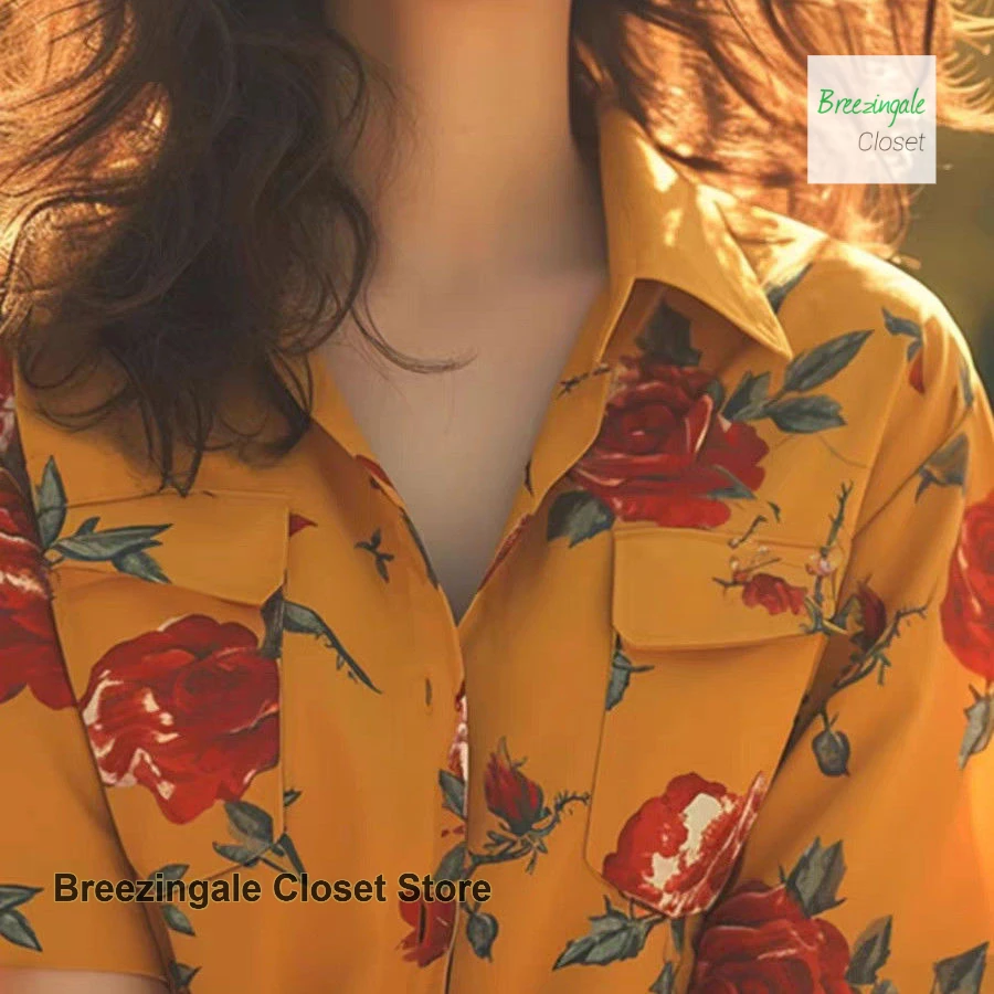 

French unique super beautiful top women's summer new fashion design sense niche retro yellow floral short-sleeved shirt