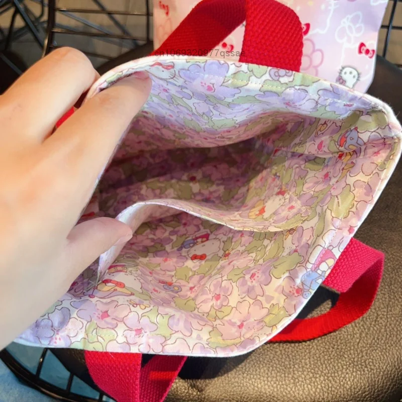 Sanrio Hello Kitty Girl serce bawełniana różowa tkanina torba na ramię damska haftowana kokardka ręcznie robiona przenośna podręczna torba