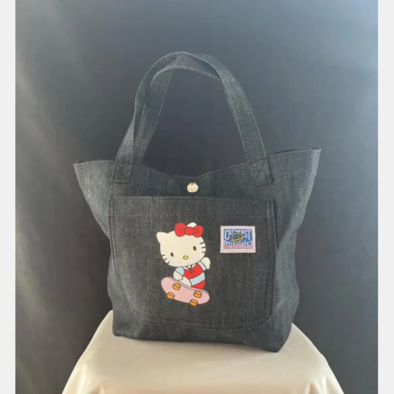 Borsa 2024 New Sanrio Original Hello Kitty Printed Denim borsa a tracolla di grande capacità Hello Kitty Bags for Women