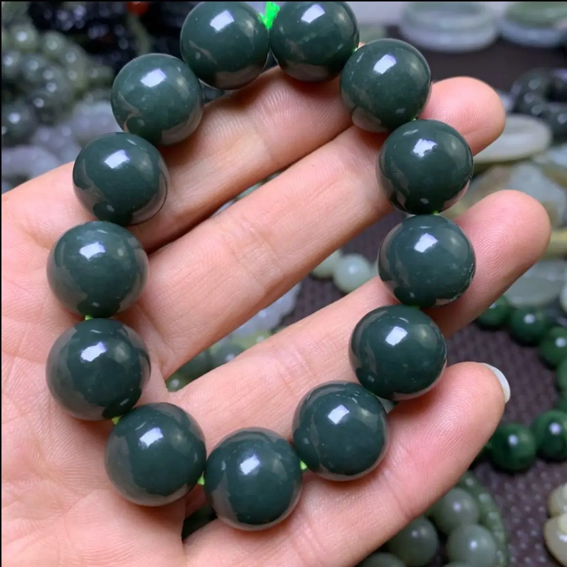 

Pure natural Hetian jade Xinjiang material Qiemo blue card 16mm round bead bracelet, oily, diverse and popular auspicious gift