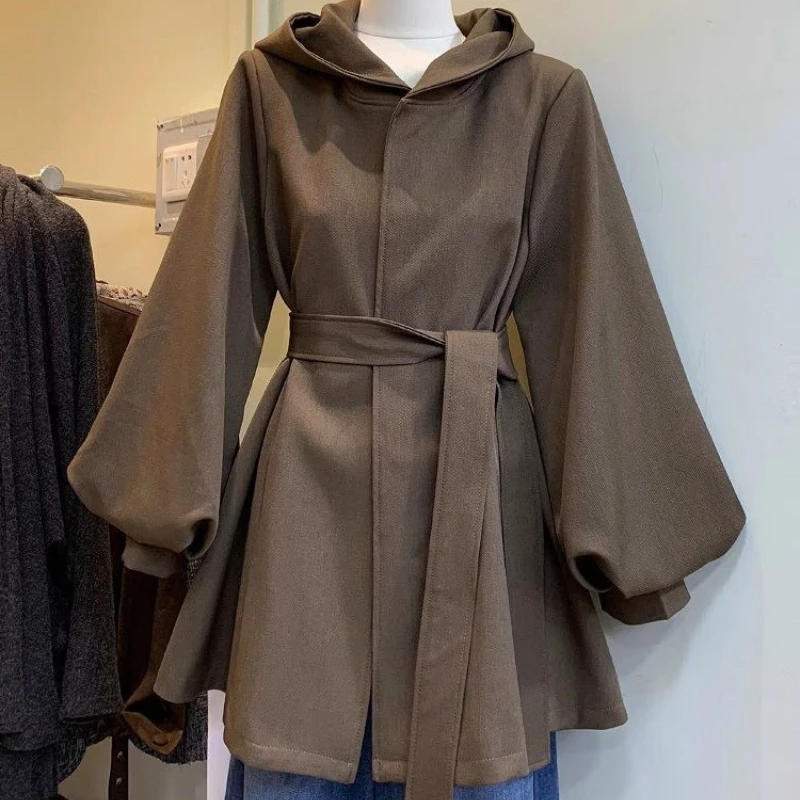 

Новое осеннее модное пальто с рукавами-фонариками в корейском стиле, утепленное, с капюшоном, на шнуровке, с регулируемой талией, средней длины, для женщин