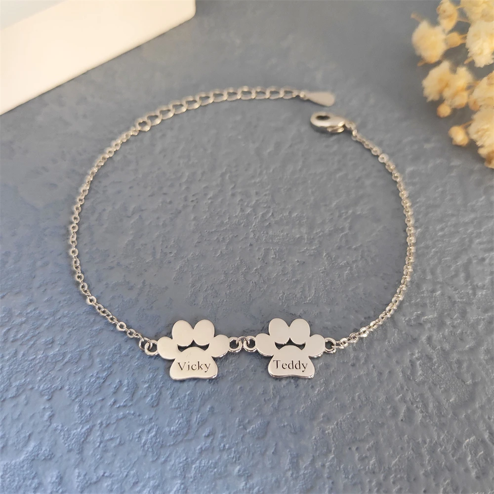 

Изготовленный на заказ браслет в виде собачьей лапы, персонализированный браслет с гравировкой имени, регулируемая цепочка из нержавеющей стали с принтом лапы, подарок для любителей домашних животных