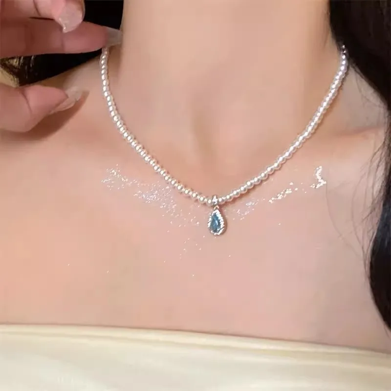 Angel's Tears ~ Cadena de clavícula con perlas y gota de agua para mujer, cadena ligera de lujo con diseño de nicho, cadena para el cuello con temperamento, nuevo collar de alta gama