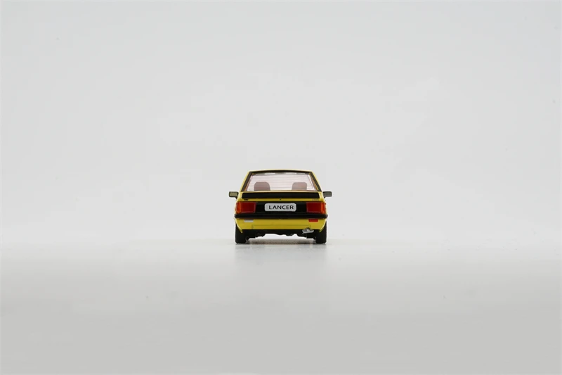 BMC 1:64 Lancer EX2000 Turbo Yellow LHD Diecast Model Car