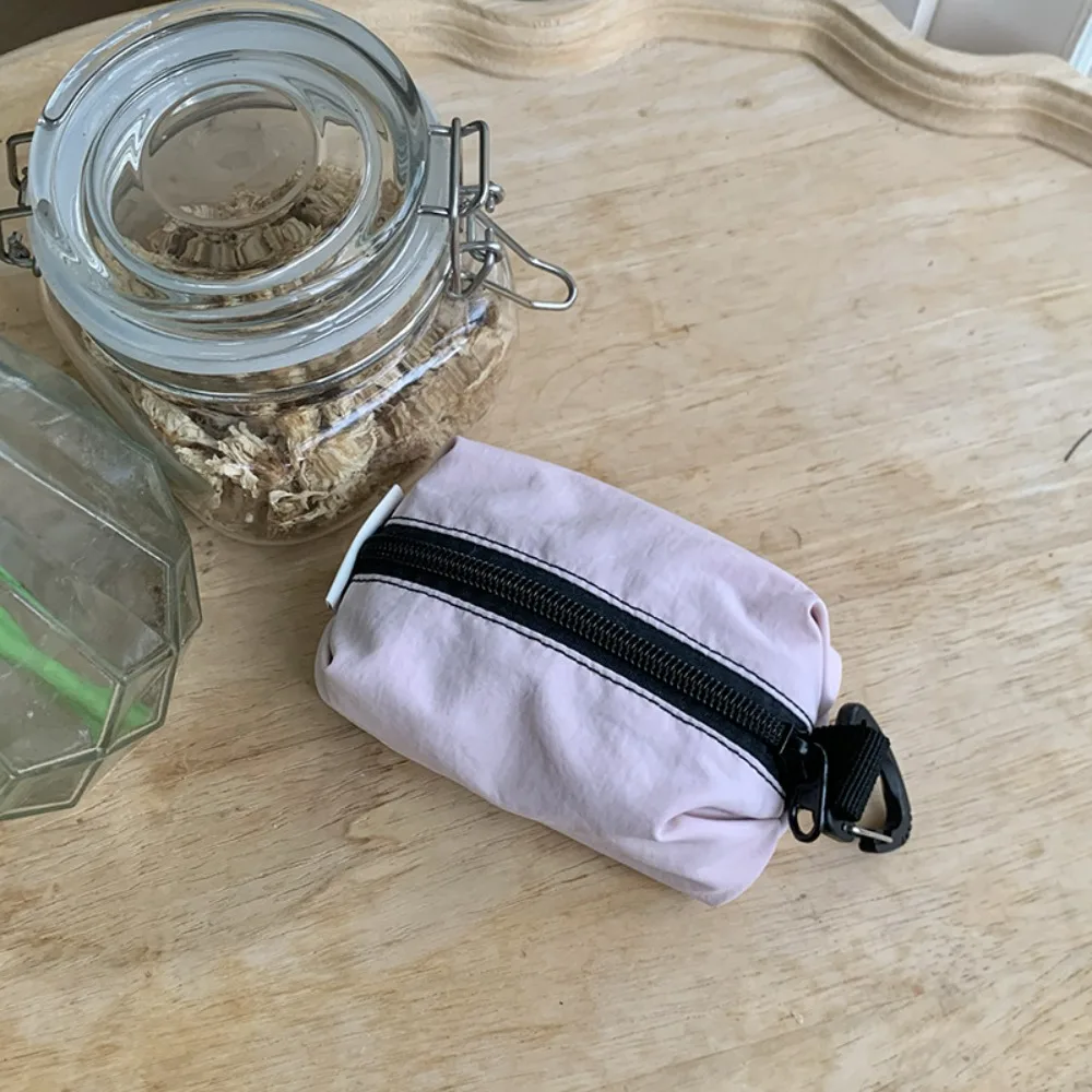 

Portable Nylon Cloth Coin Purse Solid Color Korean Style Zipper Small Item Bag Large Capacity Lightweight Cosmetic Bag Girls