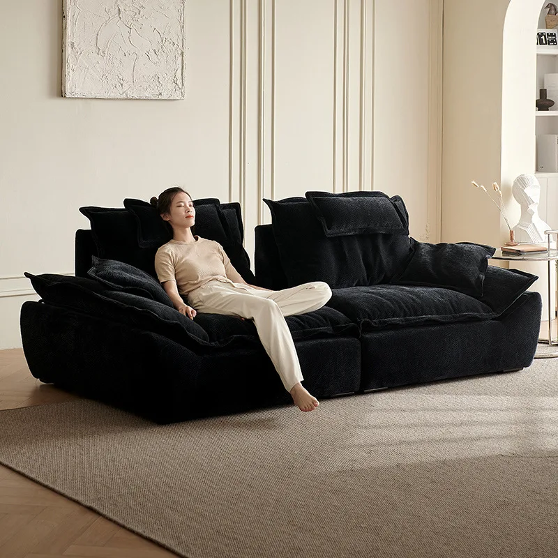 الأريكة: مقعد عريض جدًا، قماش منزلي عميق، مسند ظهر قابل للتعديل، أريكة شانيل سحابية سوداء
