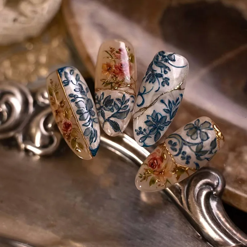 

24Pcs Long Almond Press on Nails - Vintage Floral Design with Gold & Light Blue Blossoms, Irregular Gold Lines