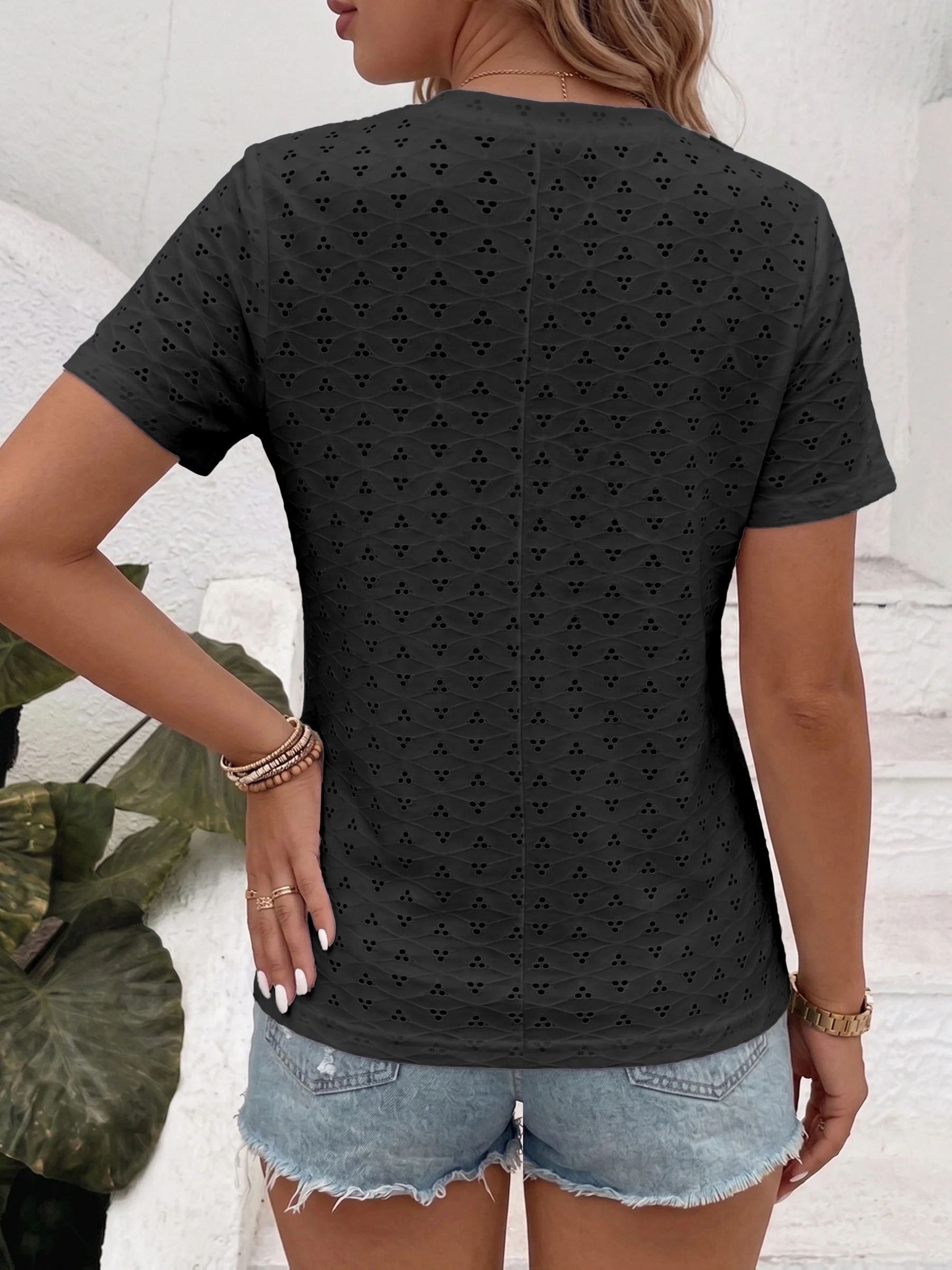 Trendy Plus Size Women's Short Sleeve Tee with Stylish Eyelet Design for Casual Chic Looks