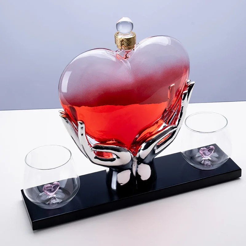 Handmade glassware heart-shaped whiskey bottle set with two glasses of whiskey vodka brandy