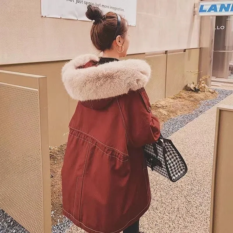 Send To Overcome The 2023 New Faux Fur To Overcome The Early Winter Hooded Coat Women Long Thickened Liner Detachable Waist Coat