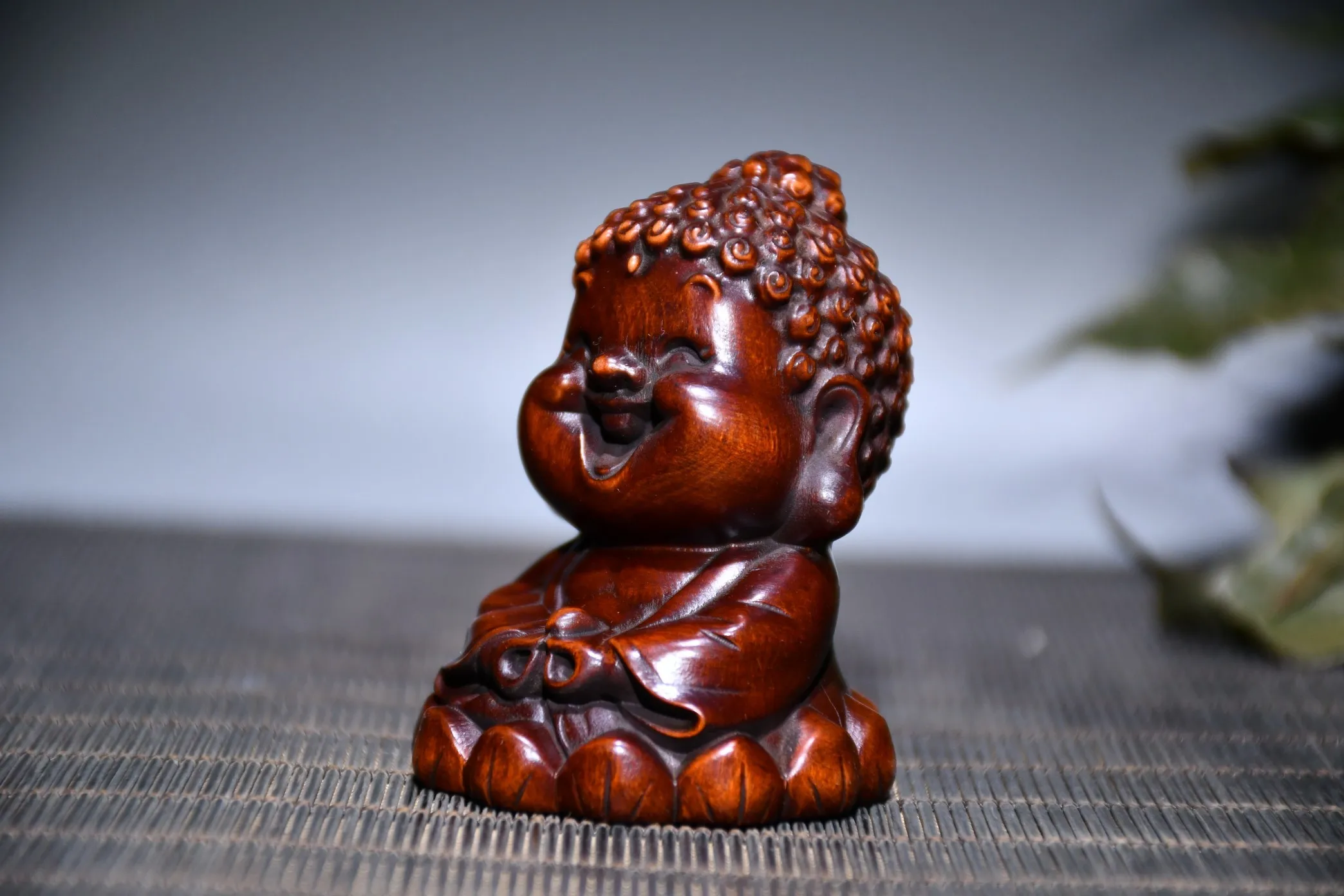 Chinese Style Cartoon Laughing Buddha Statue Wood Carving Cute Baby Buddha Sculpture Sakyamuni Decorative Statue view 3