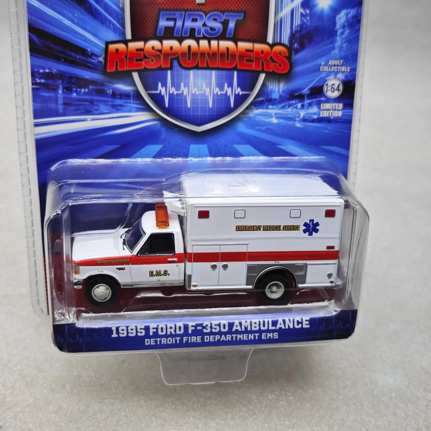 Green Light 1:64 EMTs - 1995 Ford F-350 Ambulance - Detroit Fire Department EMS