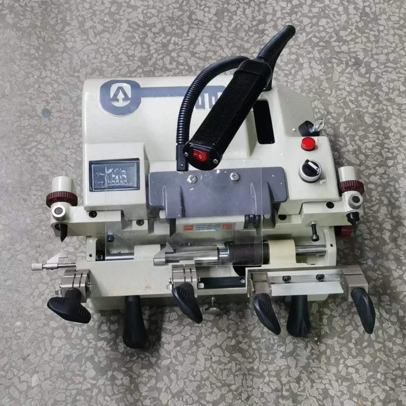 

Horizontal double-head manual knife feeding key machine/clip folding key