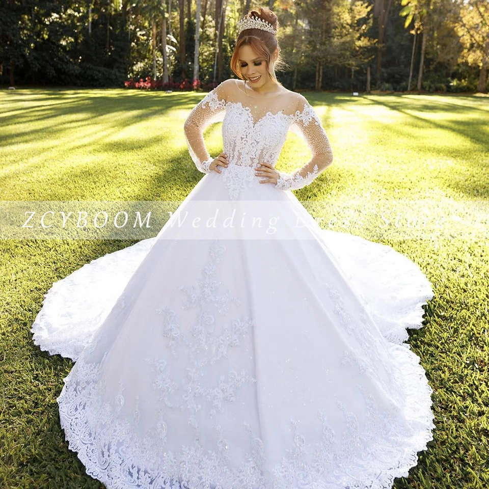 Maßgeschneidertes weißes Hochzeitskleid mit O-Ausschnitt, Applikationen, Pailletten und langen Ärmeln, Ballkleid 2025, bodenlang, Sweep-Zug, Schnür-Brautkleid