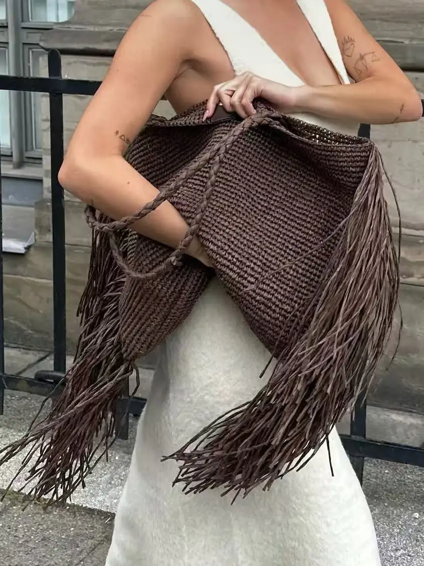 

French Fashion New Lafite Grass Hollow Woven Tassel Women's Bag Summer Beach Vacation Large Capacity Single Shoulder Bags Trendy