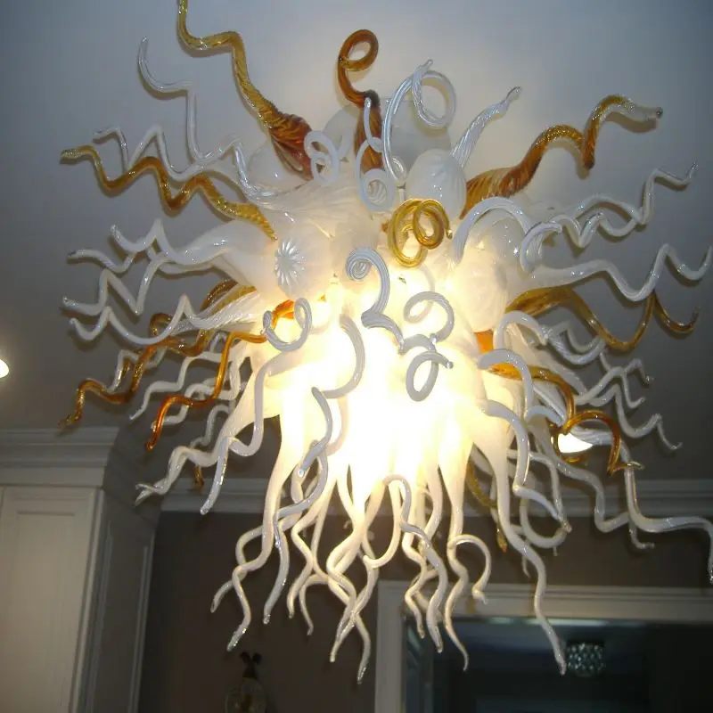 Hand-blown glass chandeliers make the unpredictable light the focal point