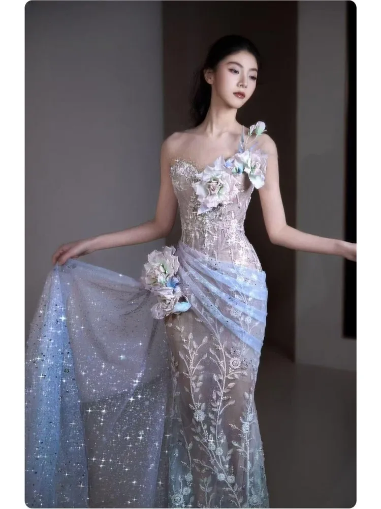 A new light luxury and niche long blue fishtail dress for graduation host banquets
