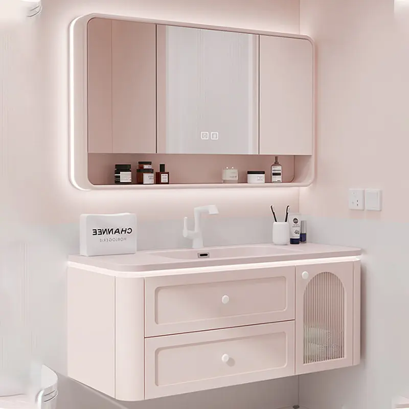 

Тумба для ванной из дуба, встроенный керамический умывальник, комбинация тумбы с розовой стеклянной дверцей и умывальником.