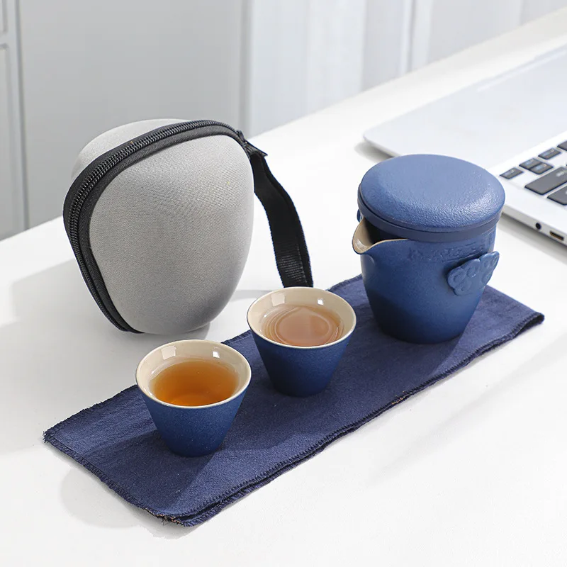 

Black pottery travel tea set a set of Kung Fu teacups portable ceramic crack cups practical handy gifts.