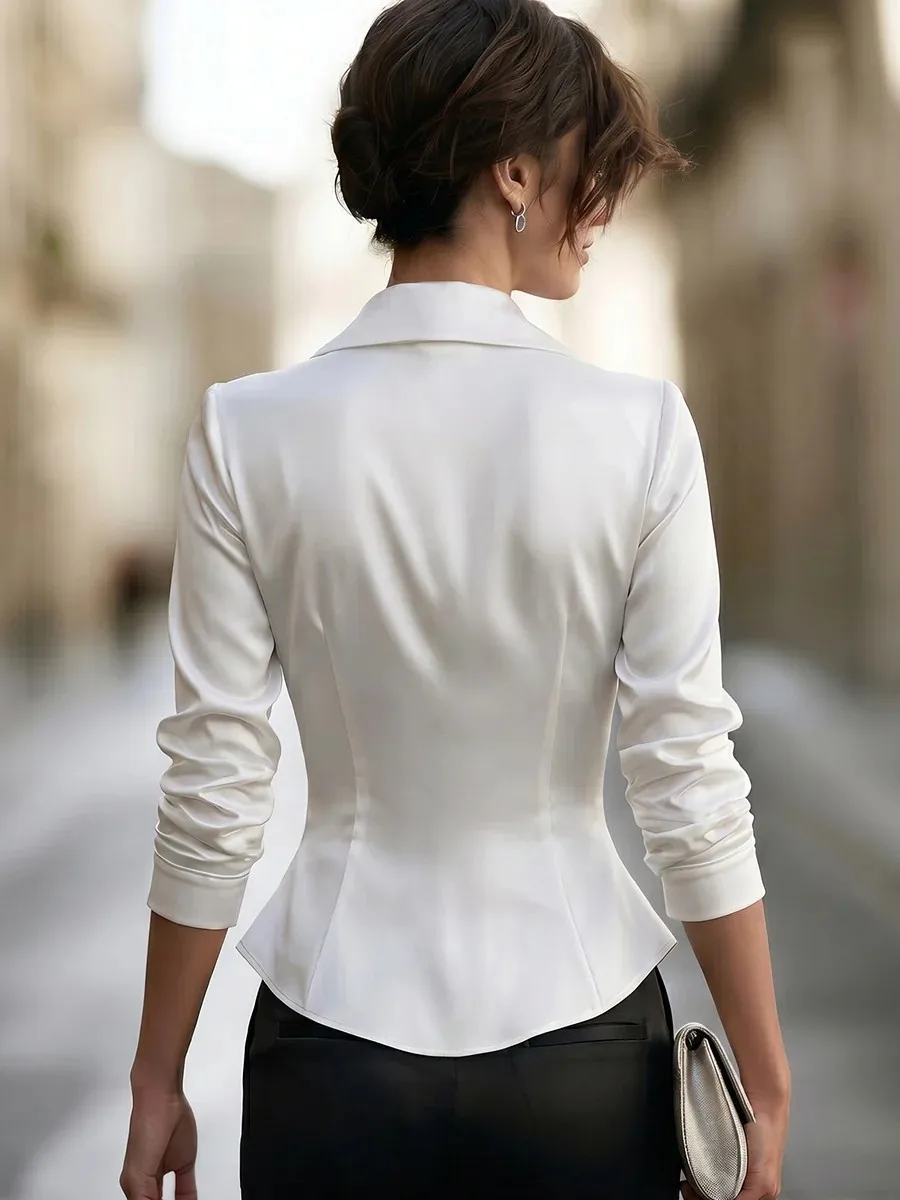 Elegant, stylish, satin-finish, deep V-neck blouse with a waist-cinching design