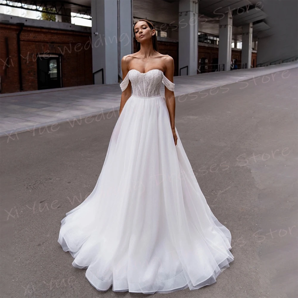 Elegancka linia damska suknie ślubne Off The Shoulder suknie panny młodej dostosowane Vestidos De Novia Boda seksowna bez rękawów Backless