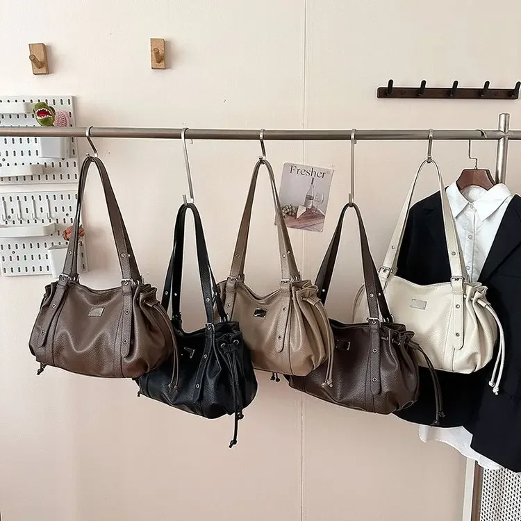 

2026 New Korean Niche Stray Bag Large Capacity Drawstring Locomotive Bag Portable Tote Bag Shoulder Messenger Bag