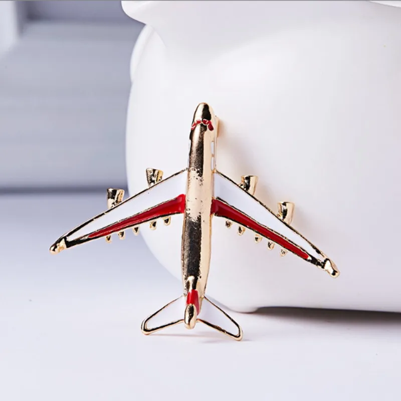 

Fashionable and cute red and blue enamel airplane brooch, fashionable women's brooch small gift