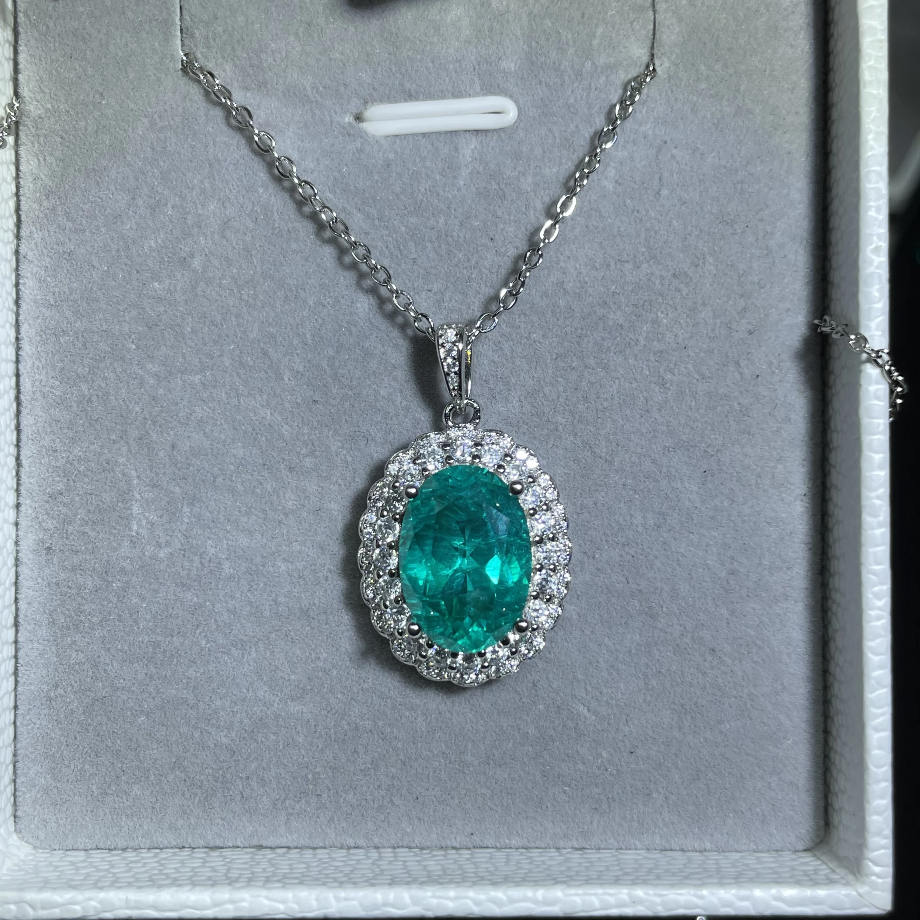 Pure natural Paraiba gemstone pendant, set with pure silver and featuring multi-layer protection. High-end custom jewelry