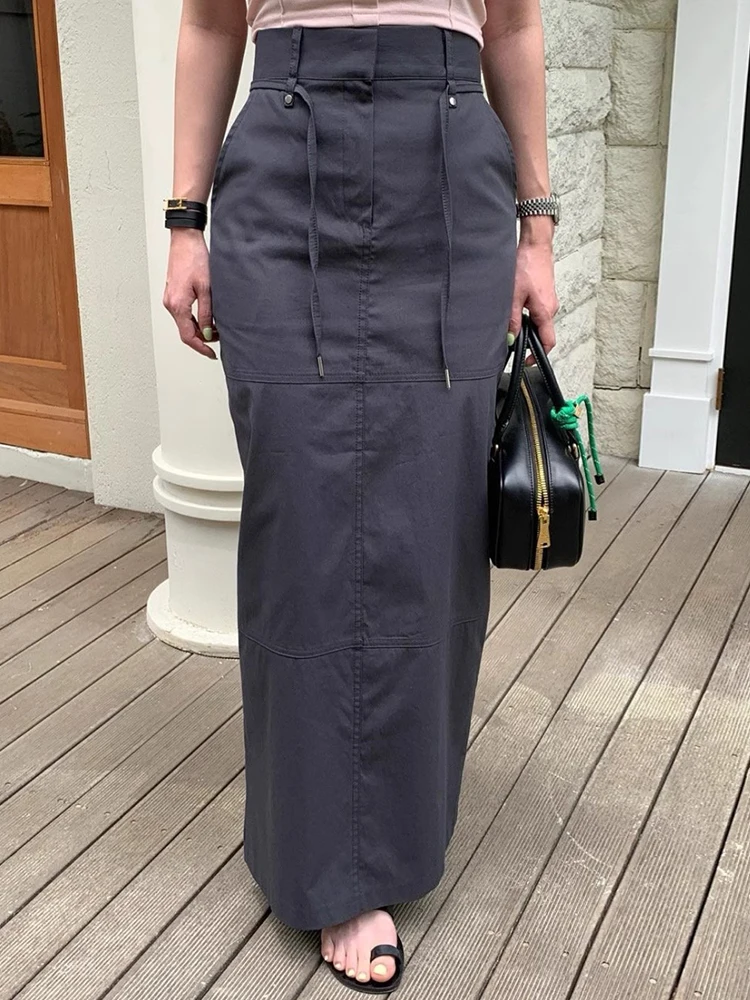 Gonna lunga elegante a vita alta con coulisse Gonna longuette da lavoro a trapezio da donna Orlo asimmetrico Effetto dimagrante Estate Versatile