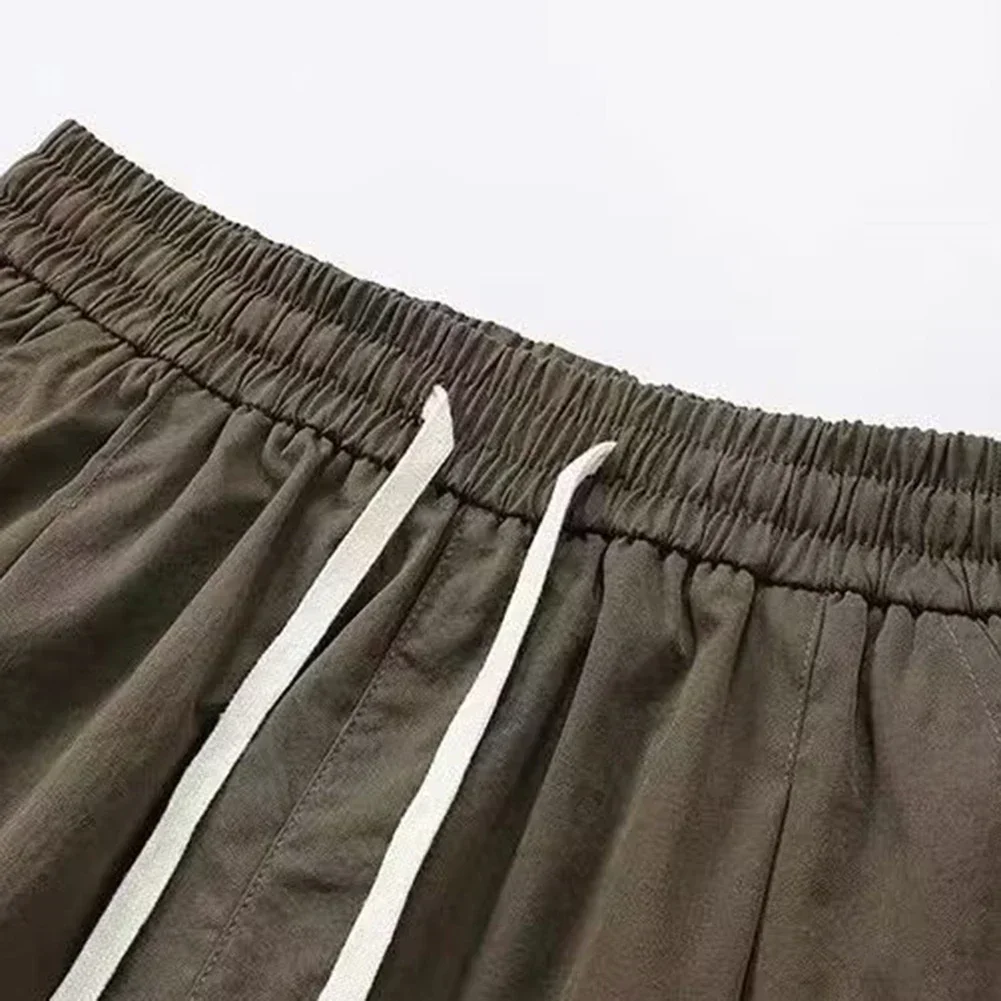 نادي ارتداء عطلة الزي الأسود رجل السراويل الرياضية كبيرة الحجم عارضة السراويل السراويل السراويل فضفاضة تناسب السراويل حجم كبير