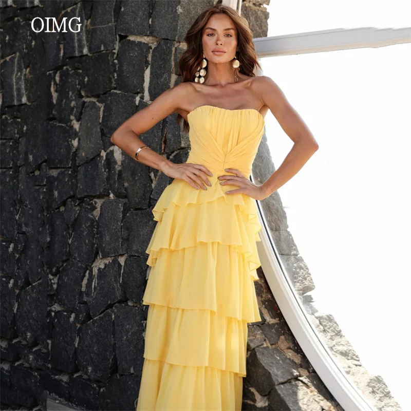 

OIMG Cream Yellow Strapless Tiered Prom Gowns Chiffon Pleated Party Gown Floor Length Evening Dress 2026 Customized