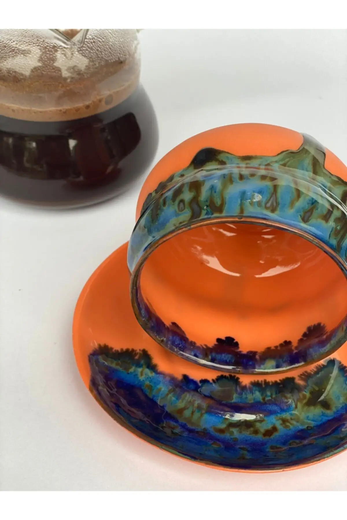 

Handmade porcelain cup and plate orange Cooper Luxury Cups