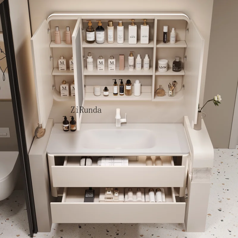 

Комплект мебели для ванной комнаты: тумба с интегрированной керамической раковиной, умывальник для туалета, тумба с раковиной для мытья рук.